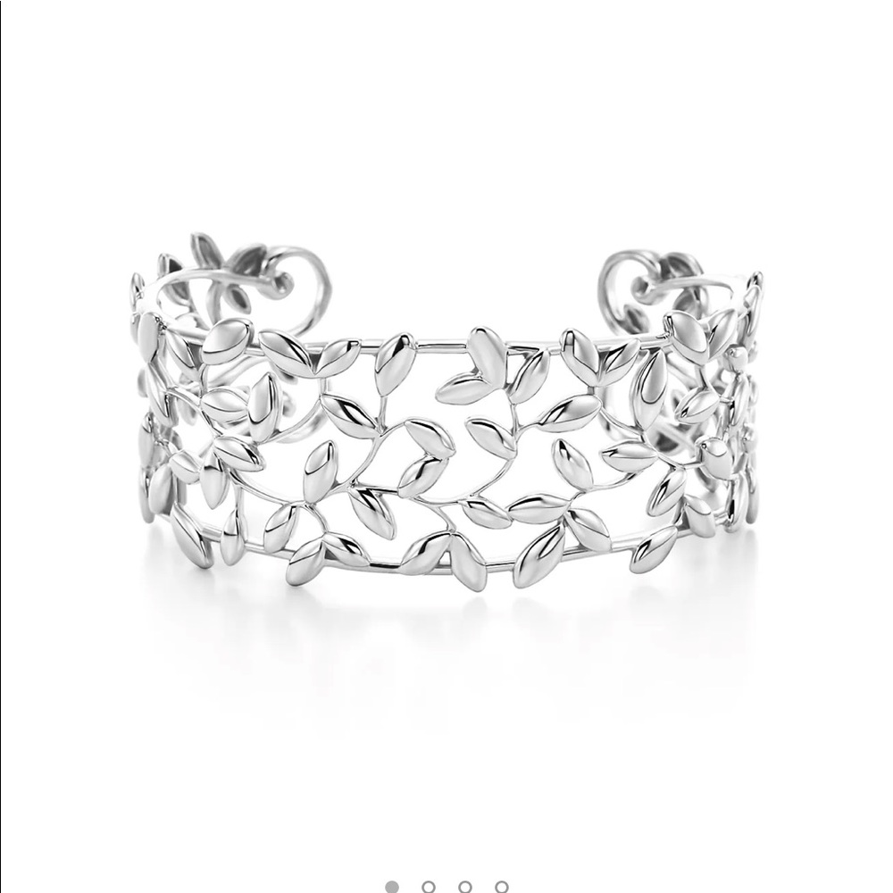 Paloma Picasso olive cuff bracelet and ring.